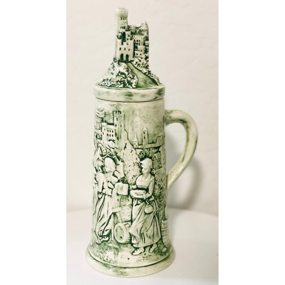 Vintage handmade green and white beer mug carved ceramic stein with castle lid